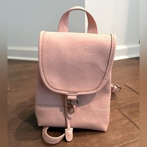 Free People mini backpack.
